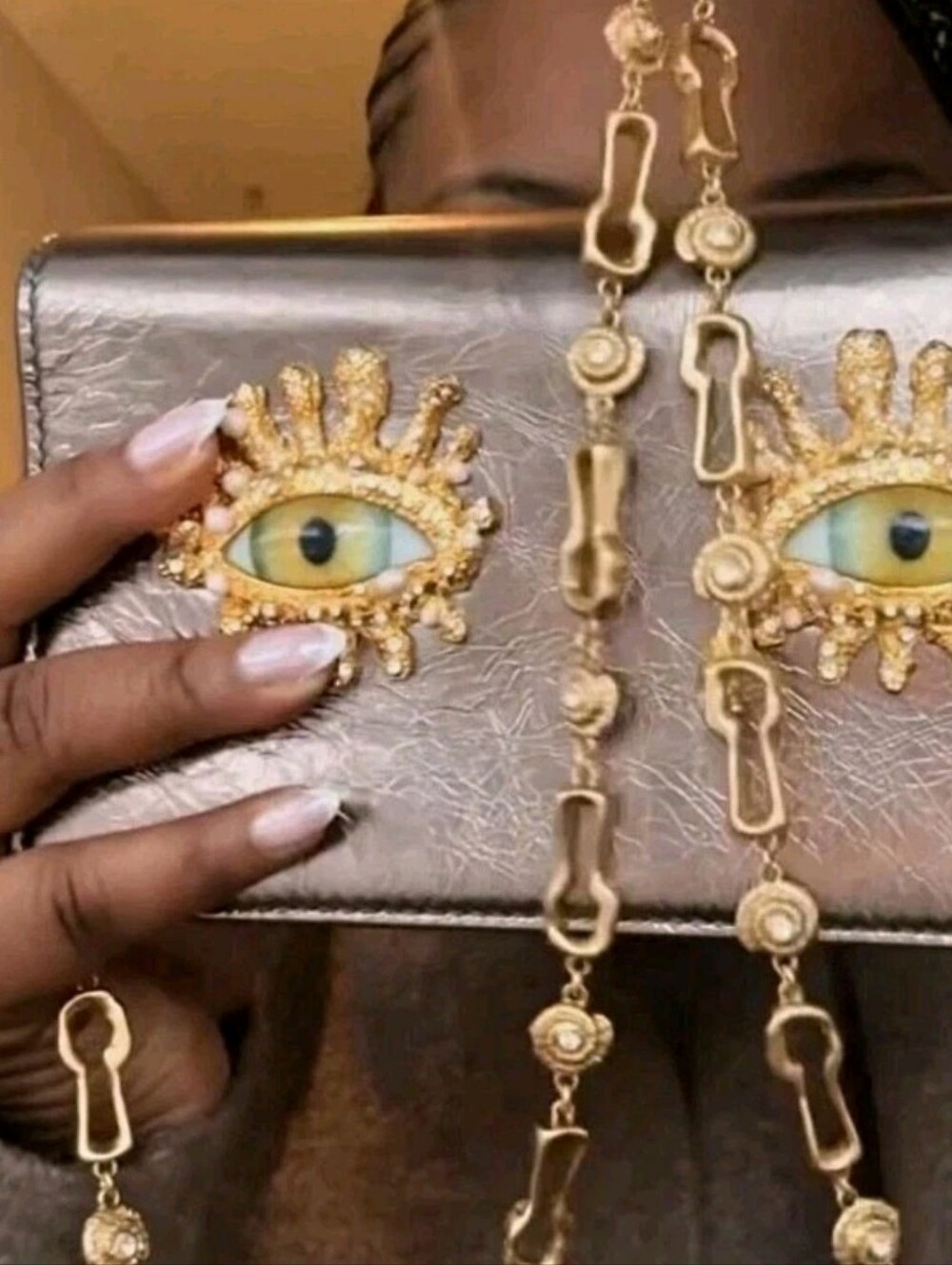 Schiapsrelli rare crysyals tearinv eye bag